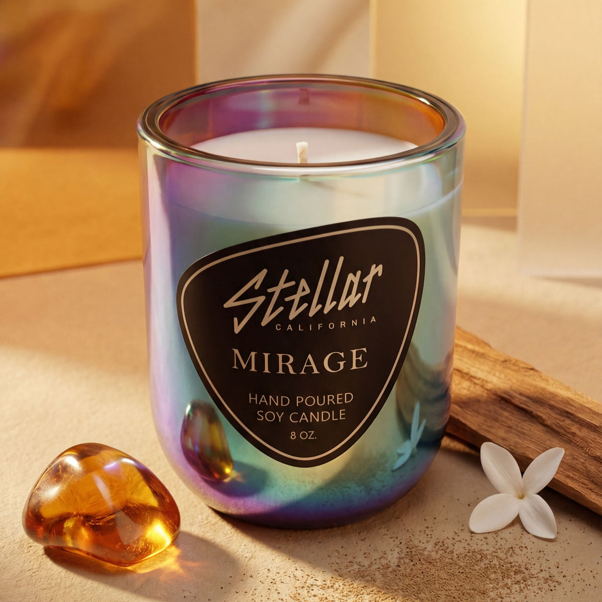 “Chromatic Mirage candle with amber and jasmine notes.”