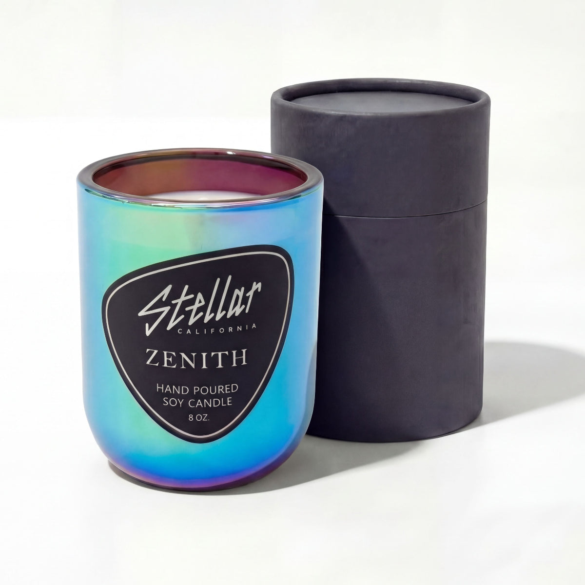 “Stellar California Zenith candle in glossy chromatic vessel.”