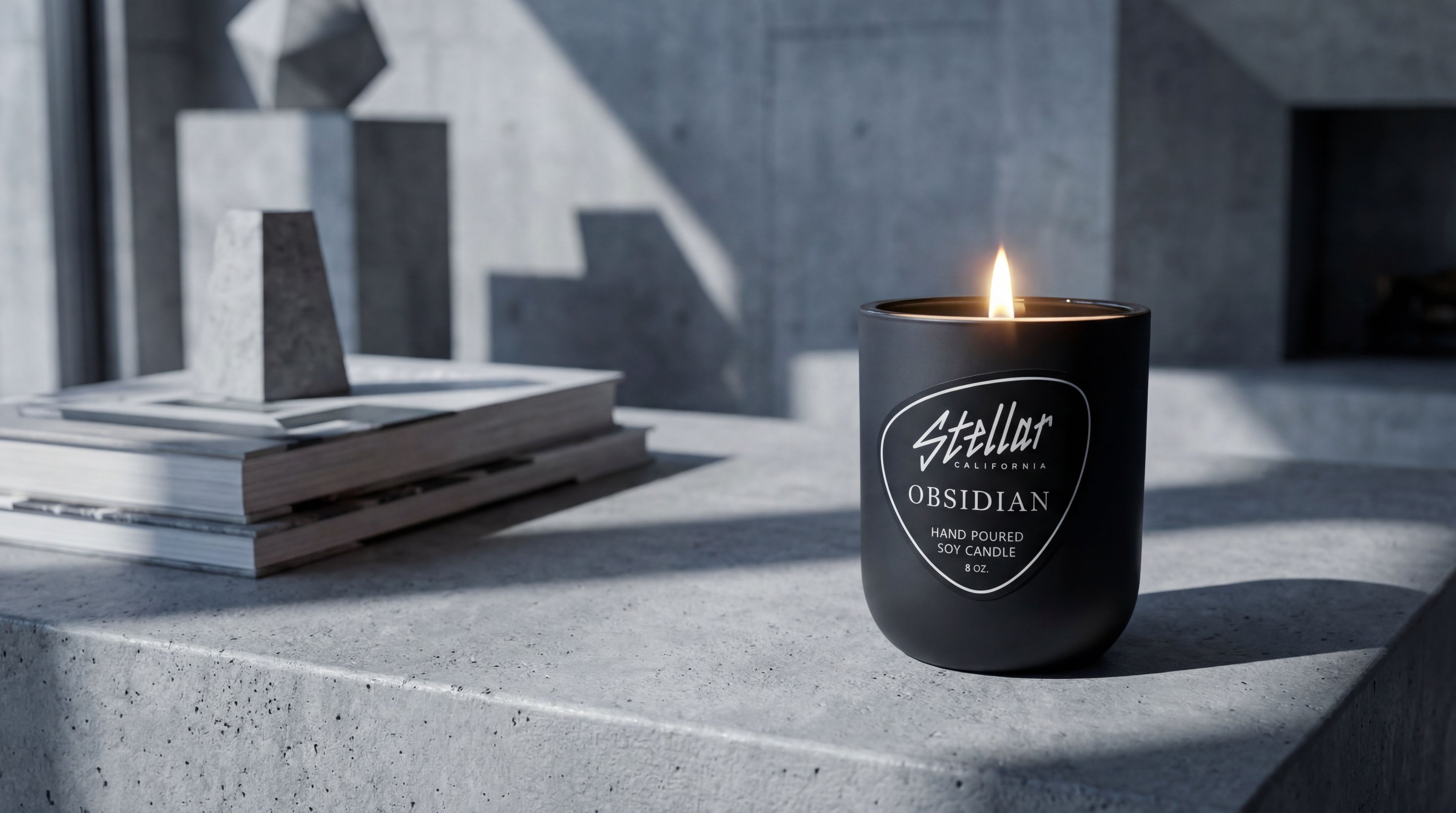 “Close-up of the Obsidian 8 oz soy candle in a matte black modern container.”